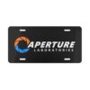 aperture-laboratories-decorative-vanity-license-plate-black-background-front Aperture Laboratories novelty license plate black background front product view, science laboratory vanity car tag. Inspired by Portal.