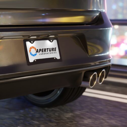 aperture-laboratories-decorative-vanity-license-plate-white-background-car-mockup Aperture Laboratories novelty license plate white background shown mounted on a car, science laboratory vanity car tag. Inspired by Portal.