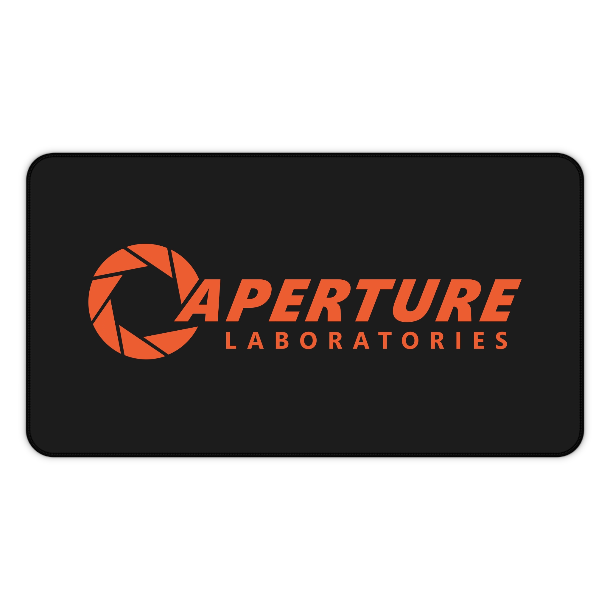 Aperture Laboratories orange logo black desk mat - front view Black Portal desk mat with a large orange Aperture Laboratories logo, front view