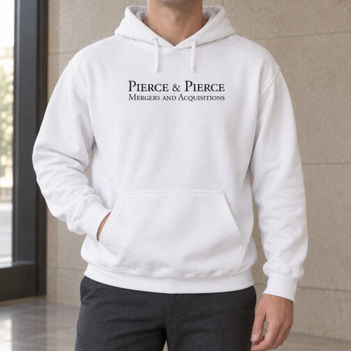 White Pierce and Pierce hoodie worn with grey trousers, showing the centered black chest print