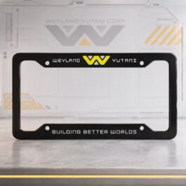 Black Weyland-Yutani License Plate Frame featuring the Weyland-Yutani Corporation logo and motto "Building Better Worlds"